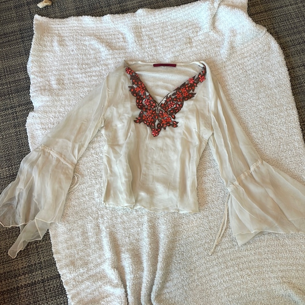 Sheer beaded bell sleeve top